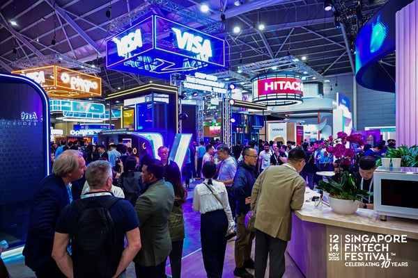 Delegates crowding the Visa stand in the exhibition hall