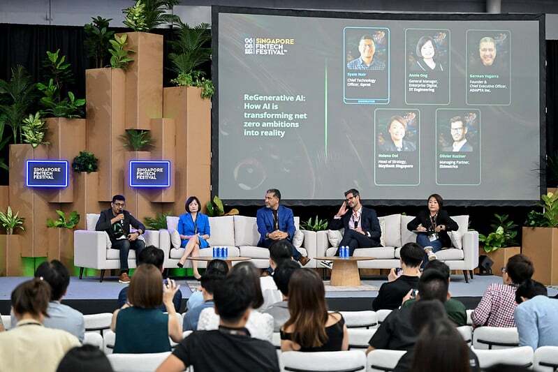 A panel on the Catalyst Stage in front of a seated audience